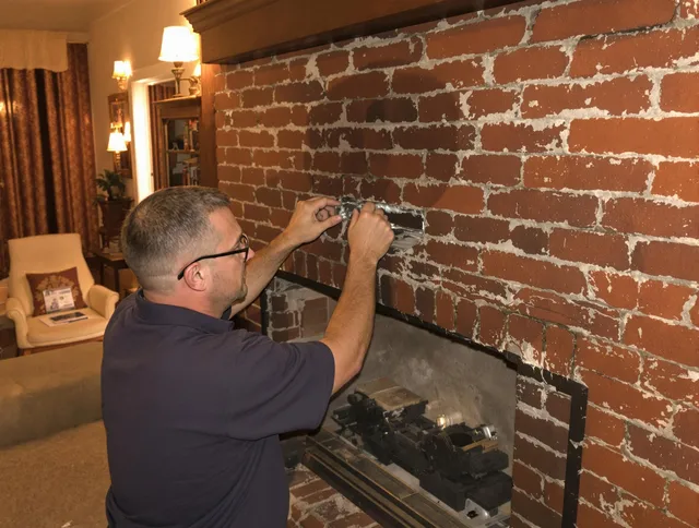 Margate Chimney Sweep expert fixing a fireplace in Margate, FL